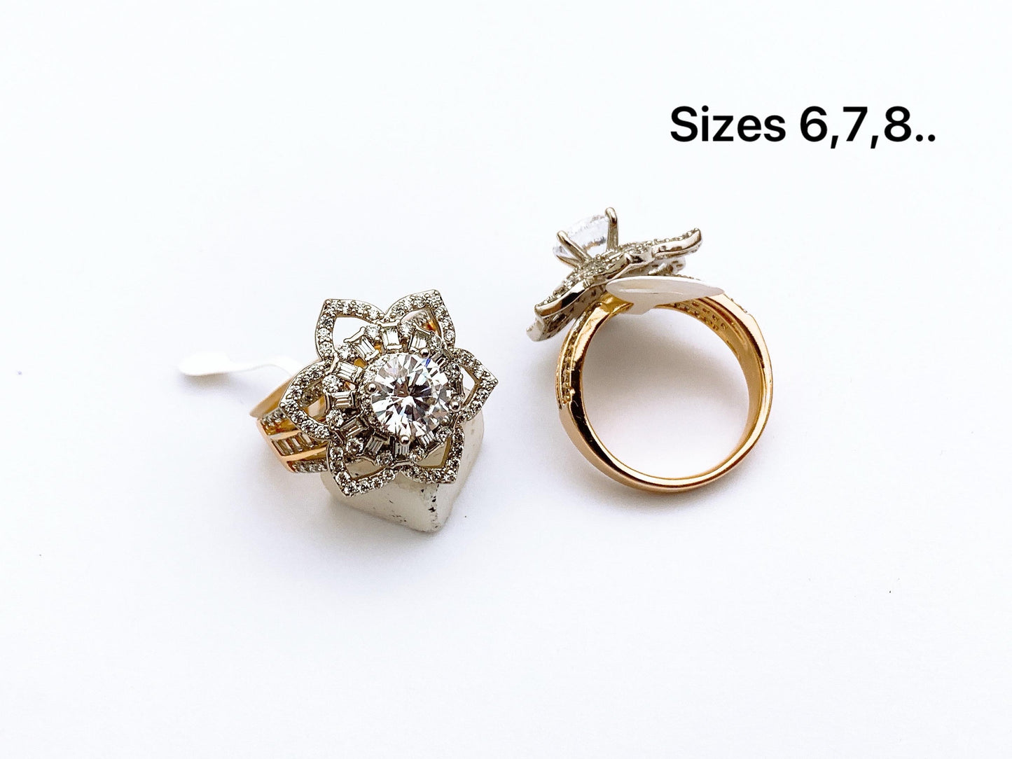 Fine stone floral halo ring with flower stone setting