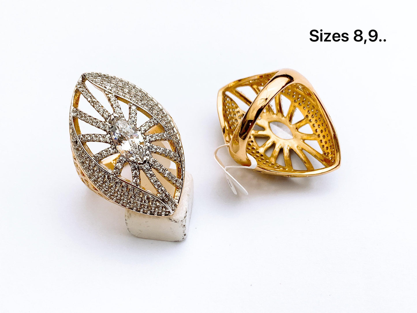 Fine stone leaf statement ring with gold tone band