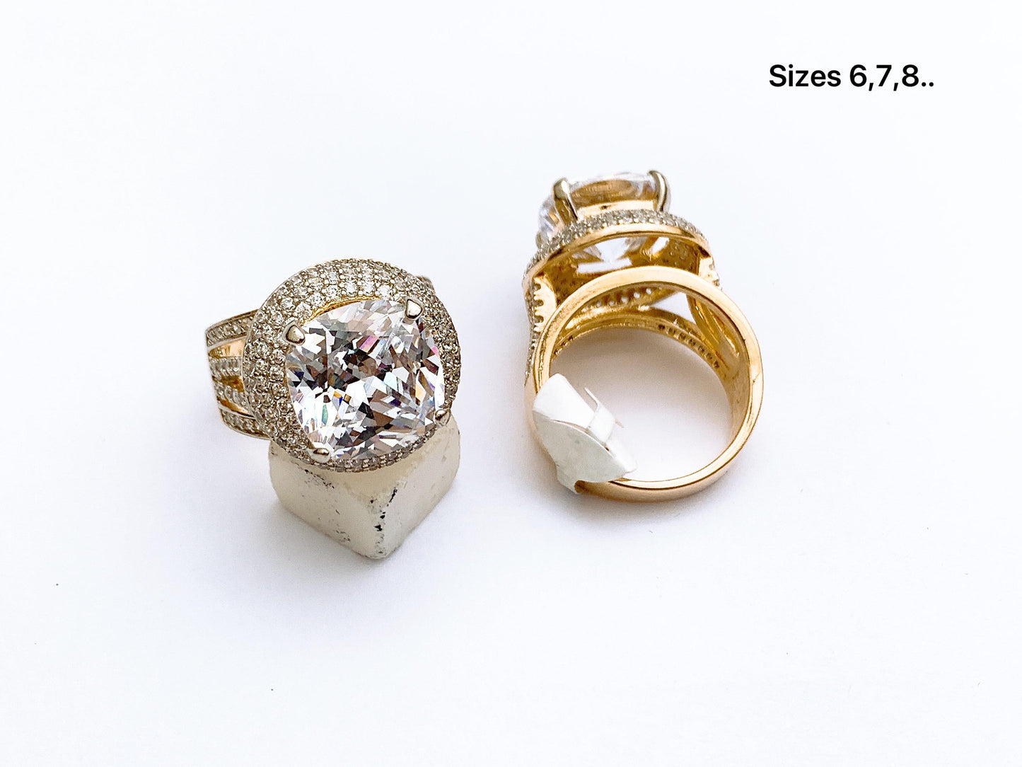 Fine stone cushion halo ring with cushion cut stone