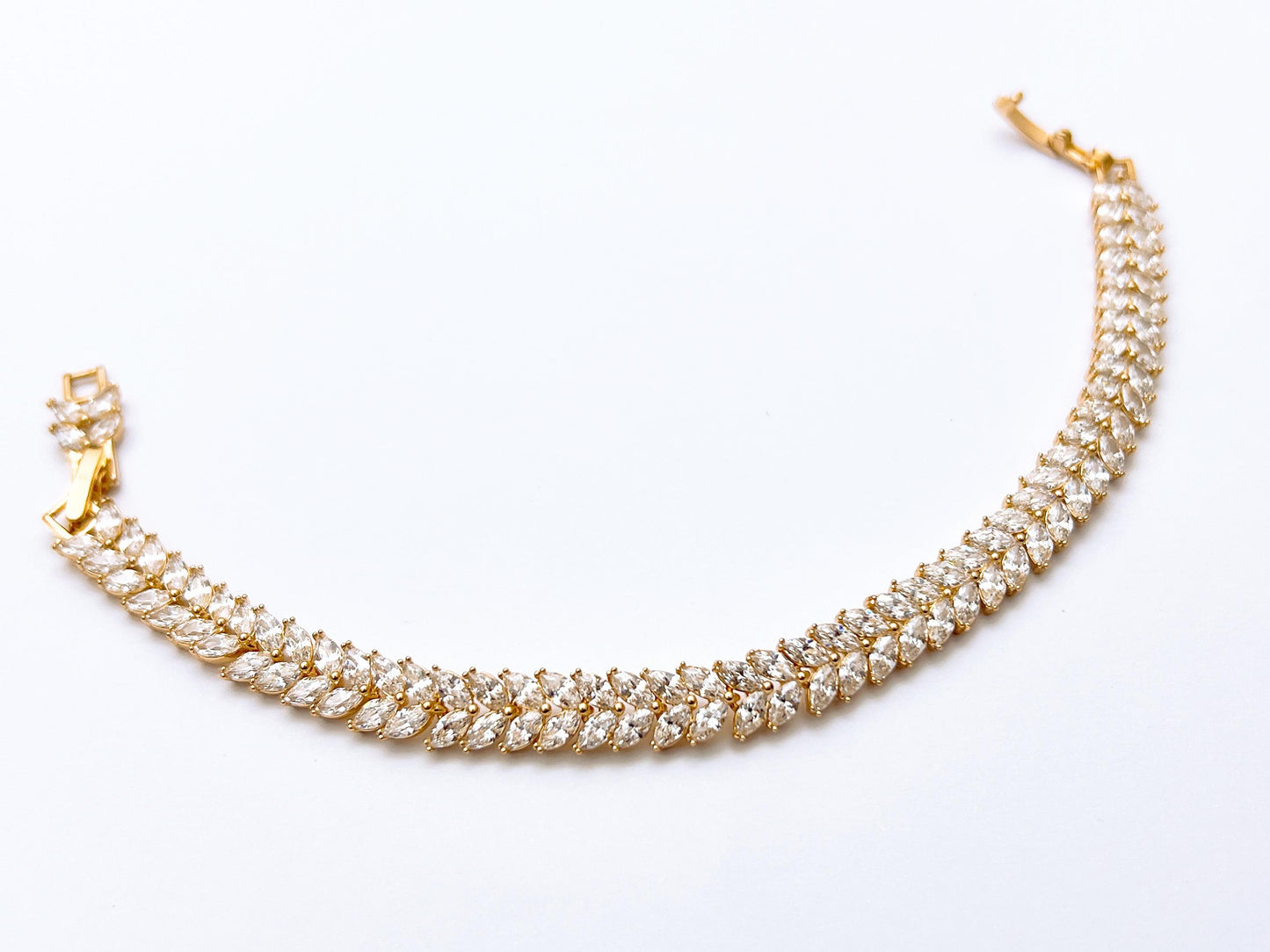 Golden leaf crystal bracelet with leaf shaped stones