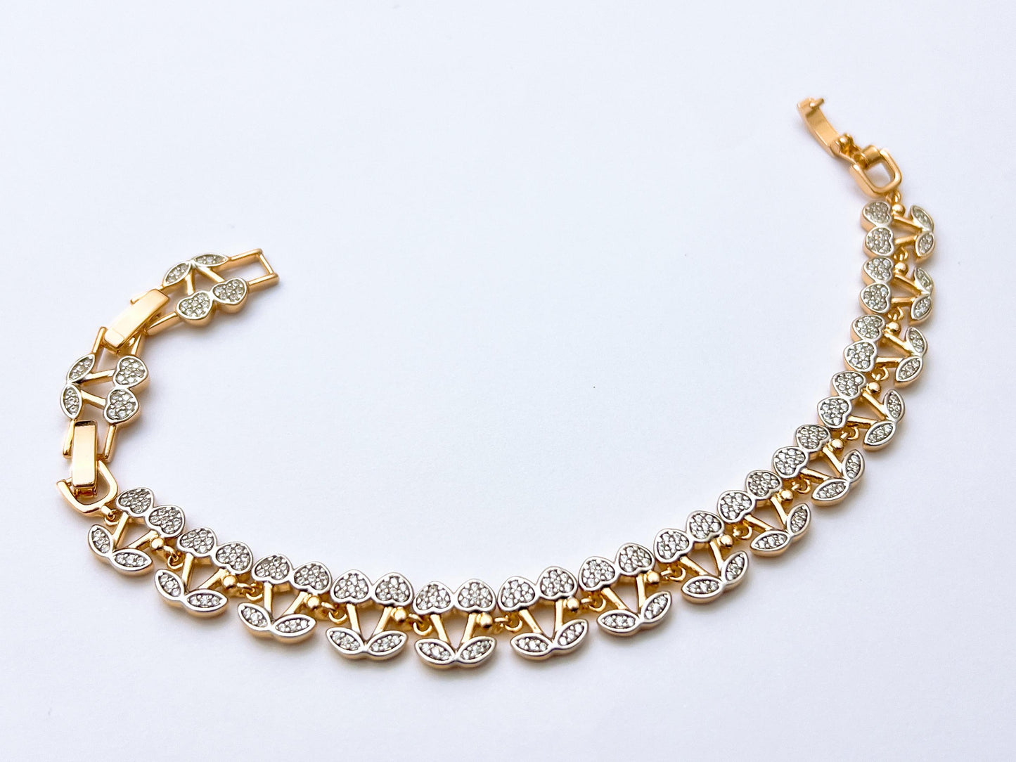 Golden heart leaf crystal bracelet in two tone finish