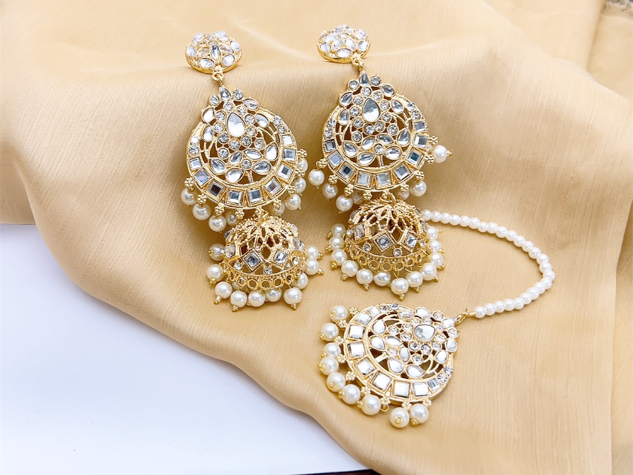 Royal pearl kundan jhumka earrings and tikka set